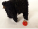 Antique mechanical toy black poodle dog with key wind-up, 20th century