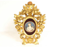 Painted miniature portrait of a young woman with grapes, Italian gilded wood frame, 19th century