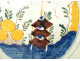 Polychrome Delft earthenware dish with orange pagoda decoration, Netherlands, 18th century