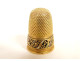 18K solid gold enameled thimble with wooden needle case and tassel 4.45g, 19th century