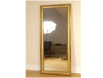 Large Louis XVI mirror with gilded wooden frame and pearls, 19th century
