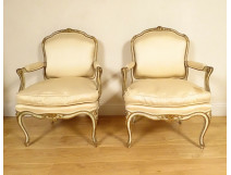 Pair of Louis XV armchairs in gilded lacquered wood with acanthus flowers, 19th century