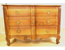 Louis XV chest of drawers with crossbow doors, carved walnut, gilt bronze, 18th century