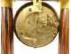 Charles X portico clock with gilt bronze marquetry and globe, 19th century