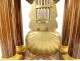 Charles X portico clock with gilt bronze marquetry and globe, 19th century