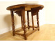 Rustic Spanish folding table with drop leaves, carved walnut, High Period, 17th century