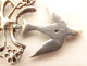 19th century Norman Holy Spirit pendant in solid silver with Rhine and dove knot stones