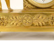 Small Empire desk clock depicting Hercules, Heracles, and the Nemean lion, gilt bronze, 19th century