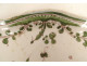 Oval earthenware dish from Moustiers with a figure, flowers, and foliage, 18th century