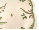Oval earthenware dish from Moustiers with a figure, flowers, and foliage, 18th century