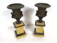 Pair of Medici marble cassolettes with Siena bronze lion vases, 19th century Restoration period