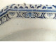 Large octagonal earthenware platter in shades of blue, Rouen, with a bouquet of flowers, 18th century