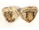 Pair of polychrome carved wood wall brackets with cherub heads and putti, 18th century