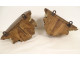 Pair of polychrome carved wood wall brackets with cherub heads and putti, 18th century