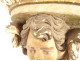 Pair of polychrome carved wood wall brackets with cherub heads and putti, 18th century