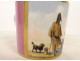 Porcelain cup and saucer depicting a Parisian scene with figures, gentleman, and dog, 19th century
