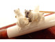 Amber cigarette holder with meerschaum carving, pug dogs, case, 19th century