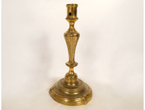 Regency style gilt bronze candlestick with garlands of flowers, 18th century