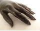 Bronze sculpture of a woman's hand, cast in the late 19th century