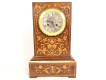 Charles X mantel clock in rosewood marquetry with flowers and foliage, 19th century