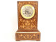 Charles X mantel clock in rosewood marquetry with flowers and foliage, 19th century