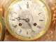 Charles X mantel clock in rosewood marquetry with flowers and foliage, 19th century