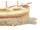 Model of a three-masted wooden cod fishing boat, a 19th-century souvenir globe