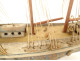 Model of a three-masted wooden cod fishing boat, a 19th-century souvenir globe