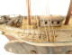 Model of a three-masted wooden cod fishing boat, a 19th-century souvenir globe