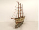 Model of a three-masted wooden cod fishing boat, a 19th-century souvenir globe