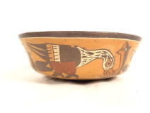 Pre-Columbian Nazca bowl from Peru, featuring birds and fish, polychrome terracotta.