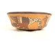 Pre-Columbian Nazca bowl from Peru, featuring birds and fish, polychrome terracotta.
