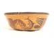 Pre-Columbian Nazca bowl from Peru, featuring birds and fish, polychrome terracotta.