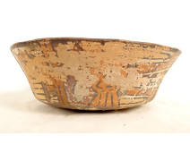Pre-Columbian Nazca bowl from Peru, featuring birds and fish, polychrome terracotta.