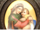 Pair of miniature porcelain Virgin and Child Christ in mother-of-pearl wood frames, 19th century