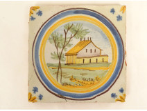 Polychrome Nevers earthenware tile depicting a landscape of a house, tree, and flowers, 18th century