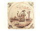 Delftware manganese tile depicting a biblical scene of Samson and the lion, 18th century