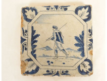Delftware manganese tile depicting a biblical scene of Samson and the lion, 18th century