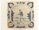 Delftware manganese tile depicting a biblical scene of Samson and the lion, 18th century