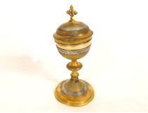 Ciborium, silver-gilt bowl, Minerva head, gilt bronze base, cross and foliage, 19th century