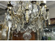 12-light bronze chandelier with cut crystal pendants and knife-shaped crystal drops, 19th century