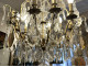 12-light bronze chandelier with cut crystal pendants and knife-shaped crystal drops, 19th century