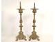 Pair of silver-plated brass and bronze church candlesticks with shell motifs, 19th century