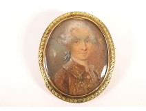 18K solid gold medallion brooch with miniature painted portrait of an 18th-century aristocrat