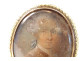18K solid gold medallion brooch with miniature painted portrait of an 18th-century aristocrat
