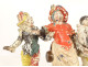 Small sculpture group of Carnival Pierrot figures, polychrome lead, 19th century