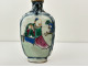 Chinese polychrome porcelain snuffbox with garden figures, late 19th century