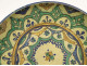 Large round polychrome earthenware dish with floral rosette, Morocco, Maghreb, Fez, late 19th century
