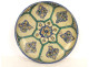 Large round polychrome earthenware dish with floral rosette, Morocco, Maghreb, Fez, late 19th century