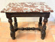 Small Louis XIII style office table in carved walnut with crimson marble top, 17th century